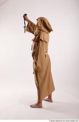 JOEL_ADAMSON MONK WITH CRUCIFIX